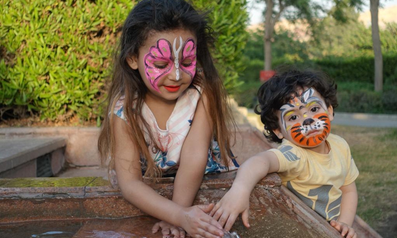 Children spend time at Al-Azhar Park in Cairo, Egypt, on June 5, 2021. Parks in Cairo, which were reopened since mid-May to the public with anti-COVID-19 measures strictly implemented, attract more and more people as the country's coronavirus pandemic recedes with per-day cases dropping to less than 1,000 for consecutive days.(Photo: Xinhua)