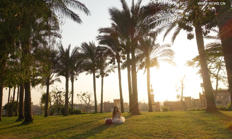 A girl spends time at Al-Azhar Park in Cairo, Egypt, on June 5, 2021. Parks in Cairo, which were reopened since mid-May to the public with anti-COVID-19 measures strictly implemented, attract more and more people as the country's coronavirus pandemic recedes with per-day cases dropping to less than 1,000 for consecutive days.(Photo: Xinhua)