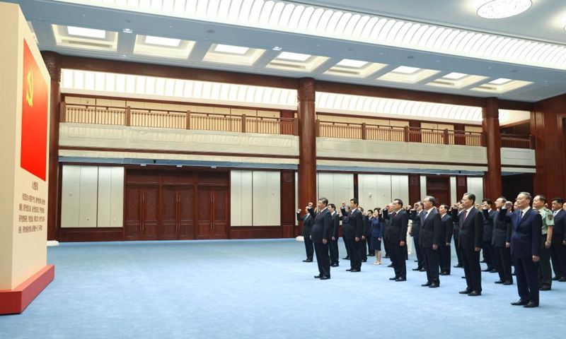 Xi Jinping leads other Communist Party of China (CPC) and state leaders Li Keqiang, Li Zhanshu, Wang Yang, Wang Huning, Zhao Leji, Han Zheng and Wang Qishan to review the Party admission oath after visiting an exhibition on CPC history themed staying true to the founding mission at the Museum of the CPC in Beijing, capital of China, June 18, 2021.Photo:Xinhua