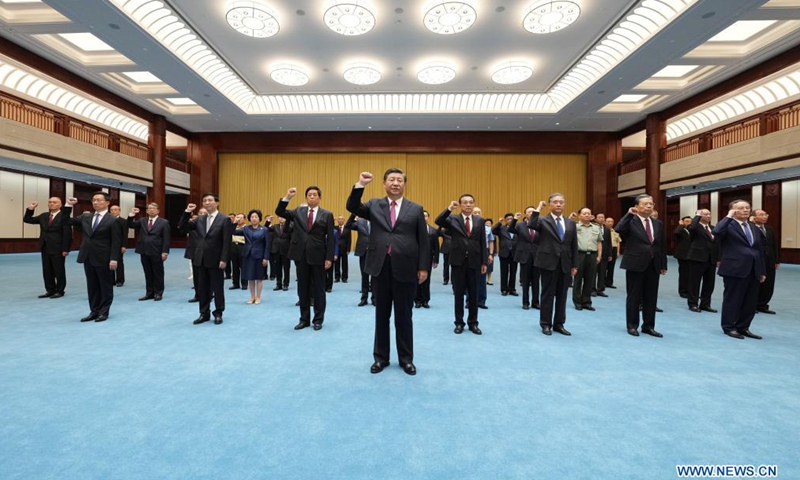 Xi Jinping leads other Communist Party of China (CPC) and state leaders Li Keqiang, Li Zhanshu, Wang Yang, Wang Huning, Zhao Leji, Han Zheng and Wang Qishan to review the Party admission oath after visiting an exhibition on CPC history themed staying true to the founding mission at the Museum of the CPC in Beijing, capital of China, June 18, 2021.Photo:Xinhua