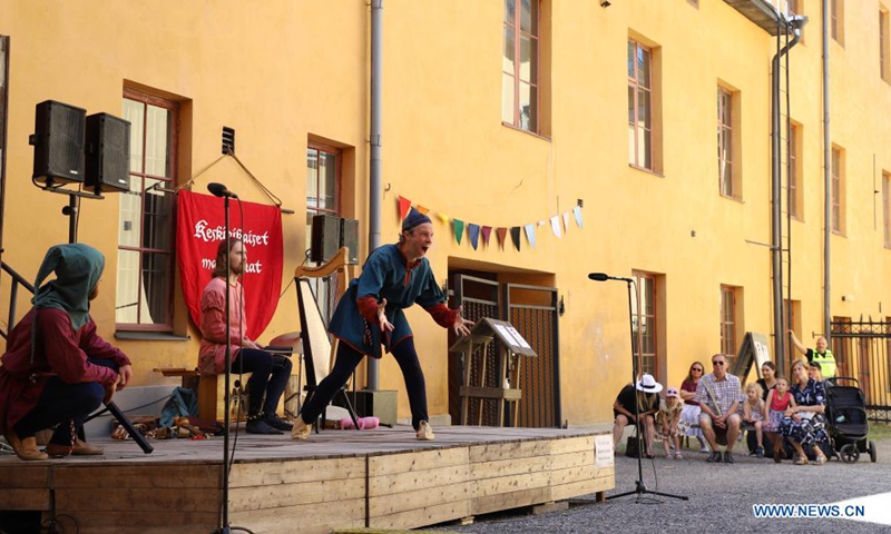 Actors dressed in medieval style costumes perform at the annual Medieval Market in Turku, Finland, July 1, 2021. The annual Medieval Market, one of the largest historical events in Finland, is held in Turku from July 1 to July 4. Due to the COVID-19 pandemic, this year's scale has been reduced and the number of visitors are severely restricted.Photo:Xinhua