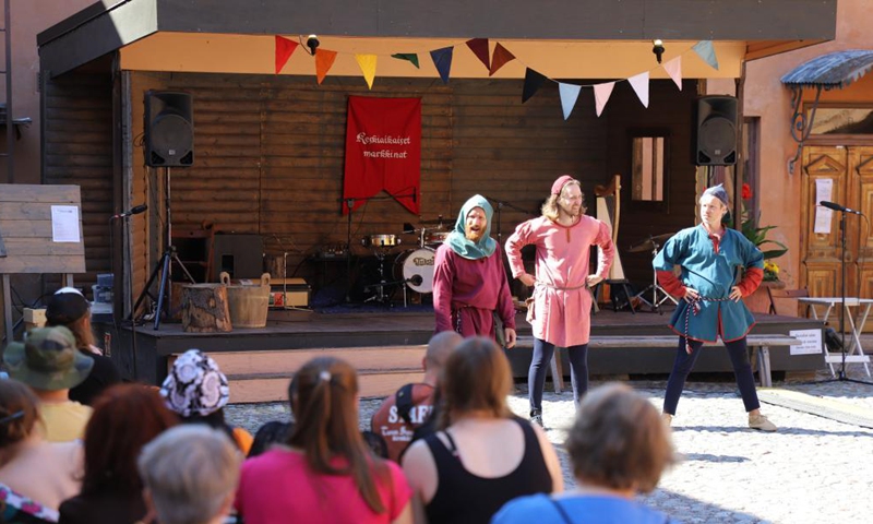 Actors dressed in medieval style costumes perform at the annual Medieval Market in Turku, Finland, July 1, 2021. The annual Medieval Market, one of the largest historical events in Finland, is held in Turku from July 1 to July 4. Due to the COVID-19 pandemic, this year's scale has been reduced and the number of visitors are severely restricted.Photo:Xinhua