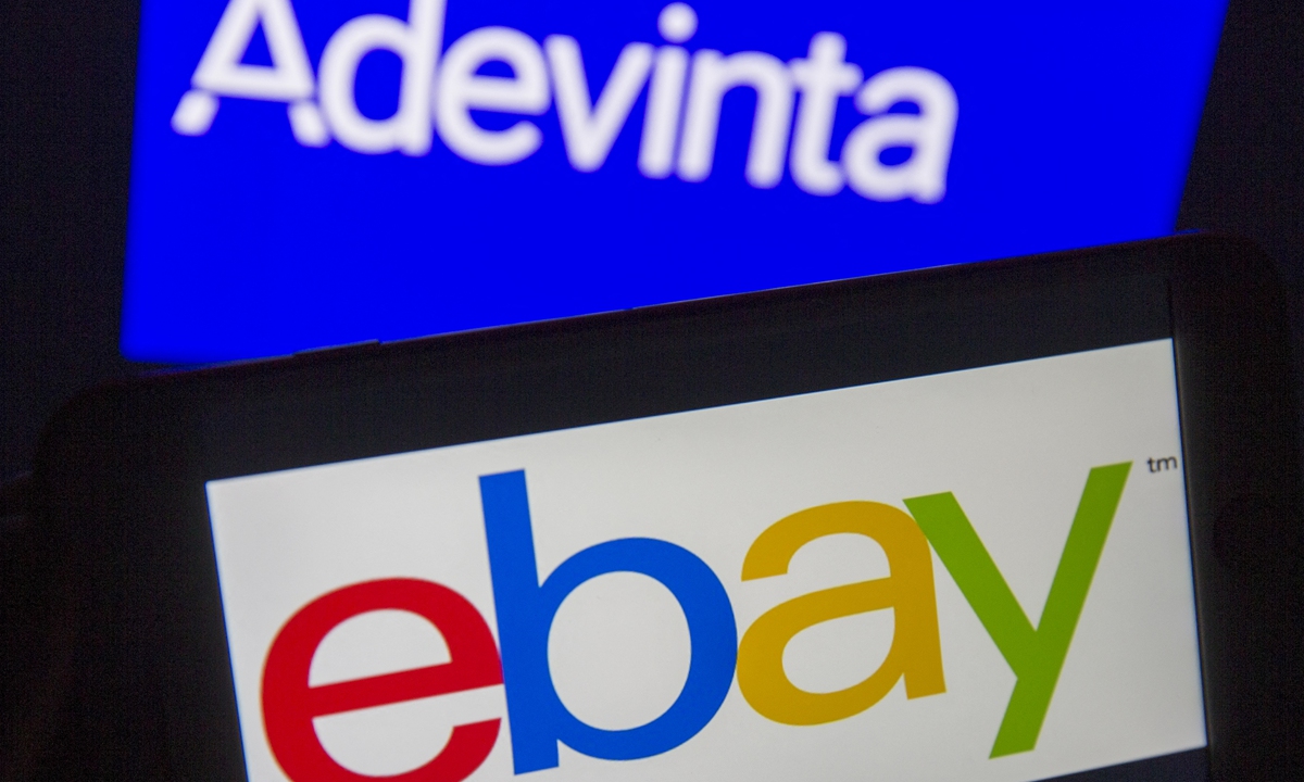  The logo of Adevinta is displayed on a smartphone as ebay logo is seen at the background on a screen on July 29, 2020. Photo: AFP