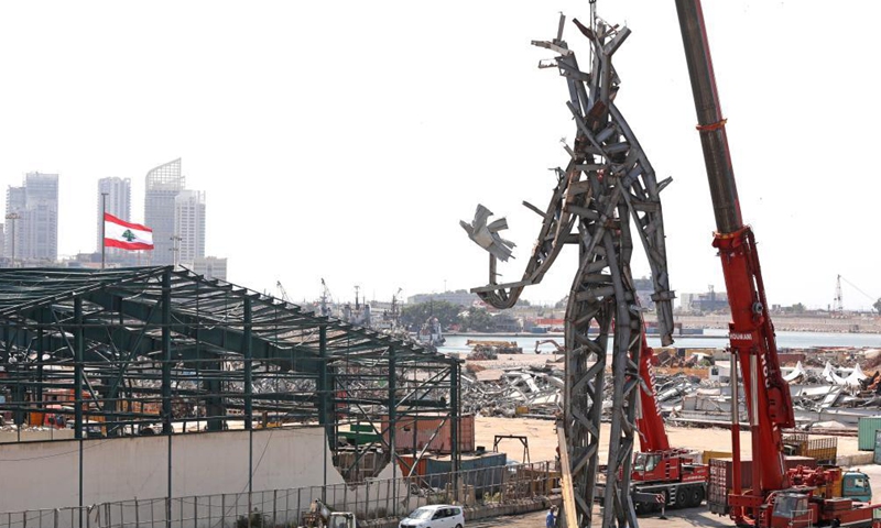 A statue named The Giant made from the remains of the Beirut port's wreckage is seen on the occasion of the first anniversary of the devastating blast at the Beirut port, Lebanon, on July 29, 2021.Photo:Xinhua