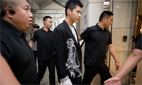 Canadian pop star Kris Wu sentenced to 13 years in jail for rape