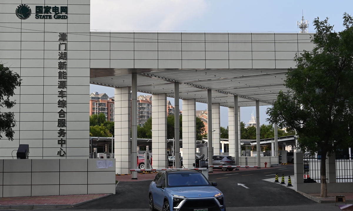 China's first near-zero-carbon charging station for new-energy vehicles opens in North China's Tianjin Municipality on Tuesday. The station uses measurement sensing, intelligent transmission, optimized control and other technologies to achieve near-zero-carbon operation, and is expected to reduce carbon emissions by about 4,575 tons per year. Photo: cnsphoto