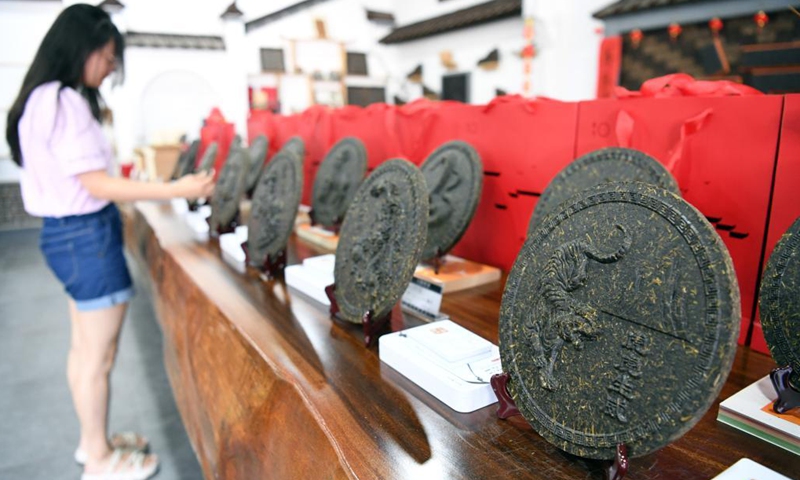 Yixian dark tea artworks are displayed at a studio in Yixian County, east China's Anhui Province, July 30, 2021.Photo:Xinhua