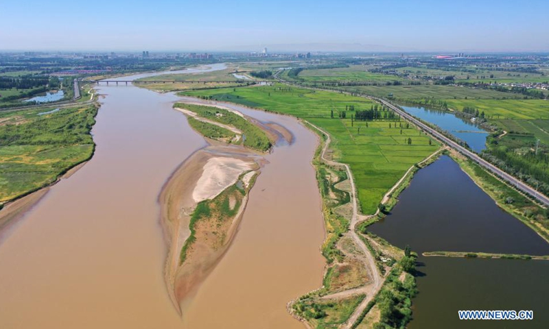 Aerial photo taken on Aug. 5, 2021 shows the scene of Yellow River in Yesheng Town of Qingtongxia City, northwest China's Ningxia Hui Autonomous Region. (Xinhua/Wang Peng)