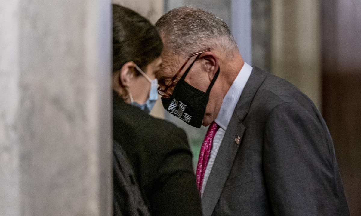 US Senate Majority Leader Chuck Schumer of N.Y. arrives as the $1 trillion bipartisan infrastructure package is expected to be voted on by the Senate on Tuesday at the Capitol Hill in Washington DC after weeks of struggles and delays. Some Republicans have been opposing the package over its size, scope and financing. Photo: AP