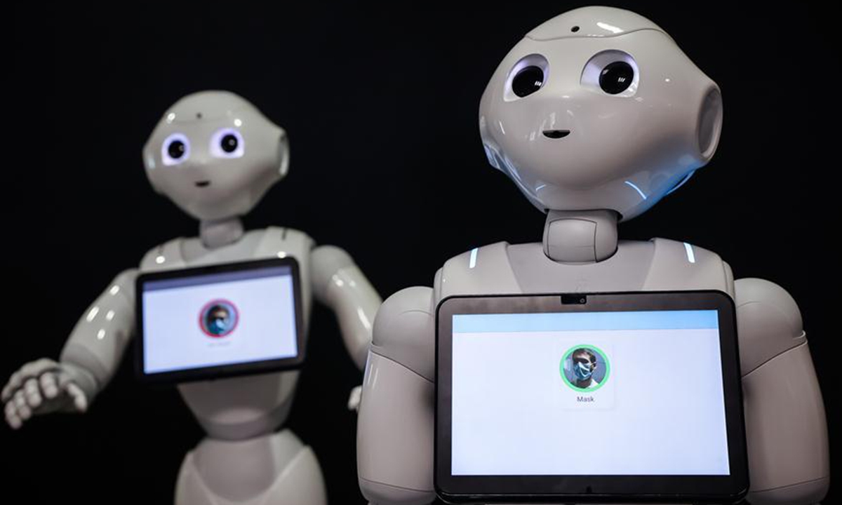 Pepper robots are seen at SoftBank Robotics in Paris, France, Sept. 10, 2020. With a new feature, Pepper robot can detect whether people are wearing face masks and if not, instructs them to wear.  Photo: Xinhua