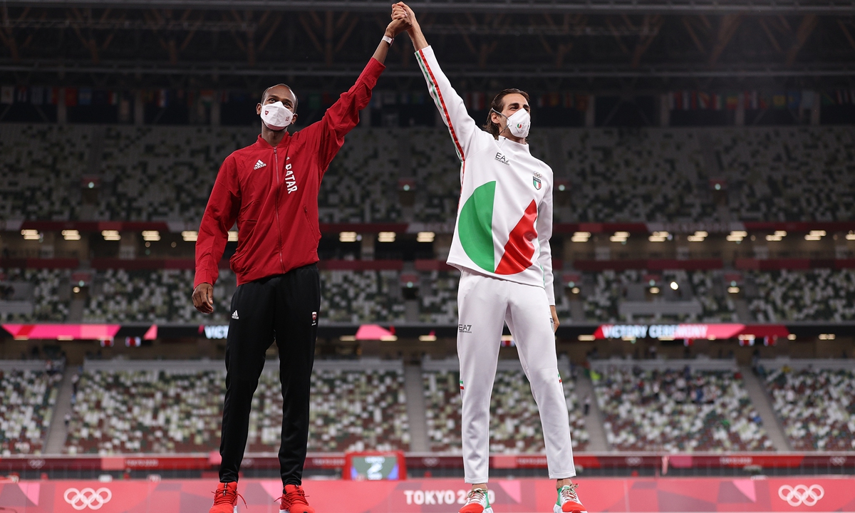 Joint men's high jump gold medalists Mutaz Barshim (left) and Gianmarco Tamberi  Photo: VCG