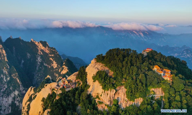 Aerial photo taken on Aug. 15, 2021 shows the Mount Huashan at dawn in Weinan City, northwest China's Shaanxi Province. (Xinhua/Tao Ming)