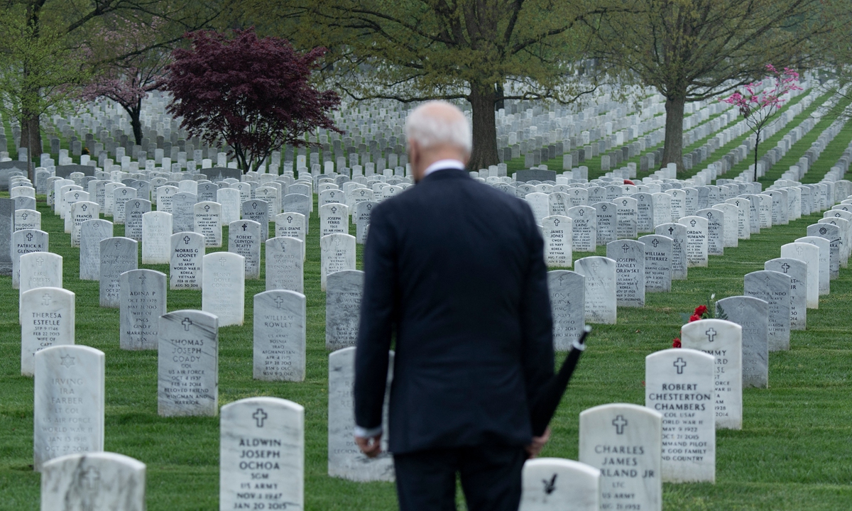 US president Joe Biden visits Arlington National  cemetery, where veterans killed in the Afghan conflict are buried, on April 14. Photo: AFP