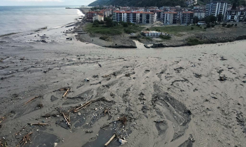 Aerial photo taken on Aug. 16, 2021 shows the flood-hit area in the town of Abana, Kastamonu province, Turkey. At least 74 people died and 47 others went missing in severe floods and mudslides in the Black Sea region of Turkey, the country's disaster agency said on Monday. Floods caused by heavy rain hit the Black Sea region in the north of the country on Aug. 11, leaving 62 dead in the province of Kastamonu.(Photo: Xinhua)