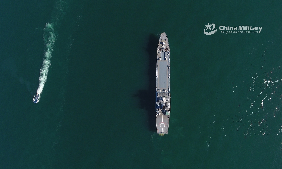 Amphibious armored vehicles attached to a brigade of the PLA Navy Marine Corps practice entering and leaving the well deck of the floating tank landing ship during a maritime training exercise in mid July, 2021. (eng.chinamil.com.cn/Photo by Liu Yuxiang)