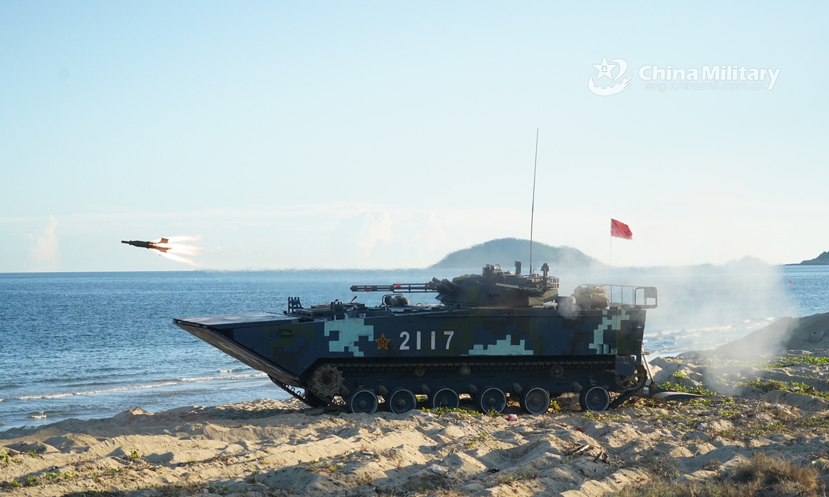 An amphibious infantry fighting vehicle attached to a brigade of the PLA Navy Marine Corps launches anti-tank missiles during a maritime live-fire training exercise in mid July, 2021. (eng.chinamil.com.cn/Photo by Liu Yuxiang)