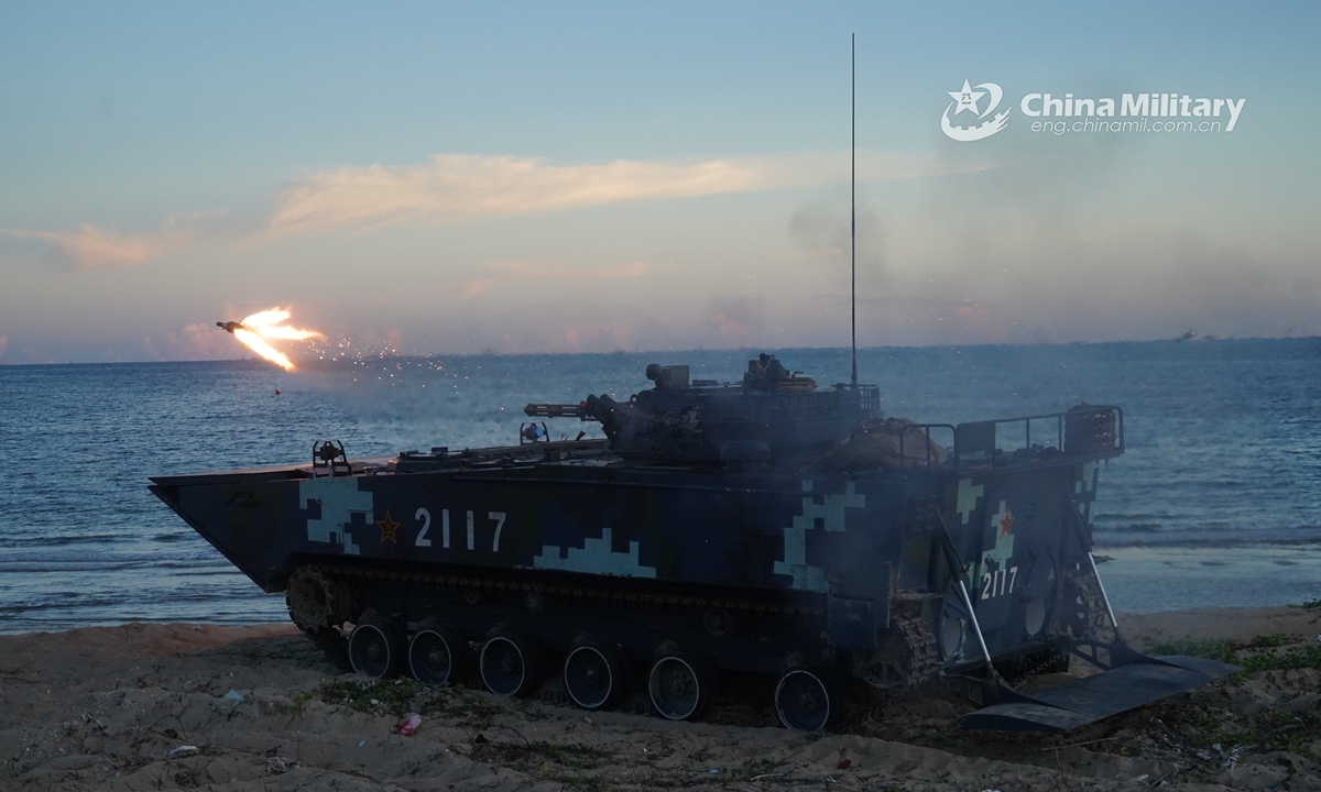 An amphibious infantry fighting vehicle attached to a brigade of the PLA Navy Marine Corps launches anti-tank missiles during a maritime live-fire training exercise in mid July, 2021. (eng.chinamil.com.cn/Photo by Liu Yuxiang)