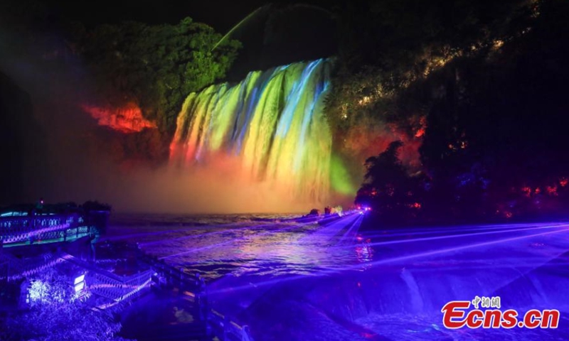 The panoramic light and shadow show is staged at Huangguoshu Waterfall in Anshun City of southwest China's Guizhou Province. (Photo: China News Service/Qu Honglun) 