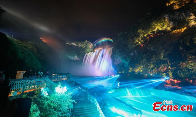 The panoramic light and shadow show is staged at Huangguoshu Waterfall in Anshun City of southwest China's Guizhou Province. (Photo: China News Service/Qu Honglun) 