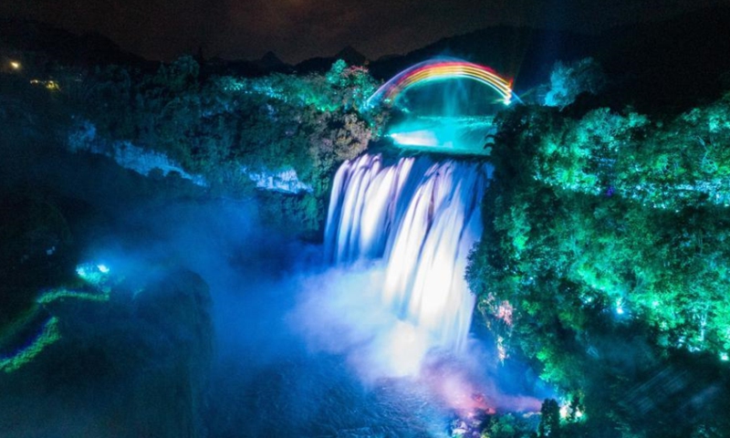 The panoramic light and shadow show is staged at Huangguoshu Waterfall in Anshun City of southwest China's Guizhou Province. (Photo: China News Service/Qu Honglun) 