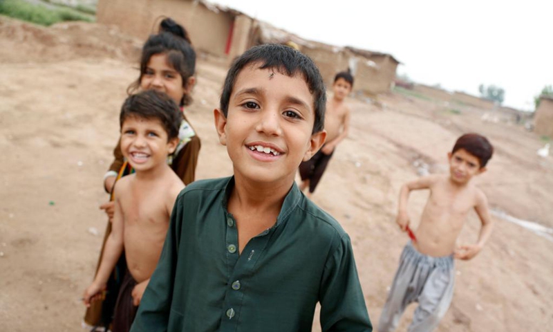 Afghan children play on the outskirts of Islamabad, capital of Pakistan, Aug. 22, 2021.Photo: Xinhua