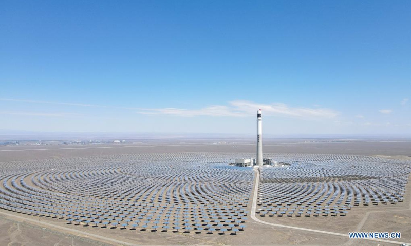 Aerial photo taken on Aug. 22, 2021 shows a photothermal power station in Nom Township of Hami, northwest China's Xinjiang Uygur Autonomous Region. The photothermal power station is the first of its kind in Xinjiang. The project is a modern attempt by the region to capitalize on its abundant solar energy and turn it into heat and power. (Xinhua/Gao Han)



