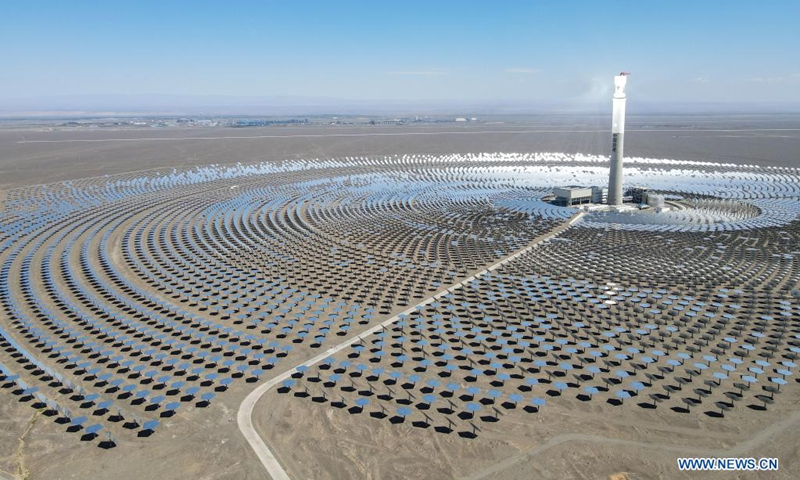 Aerial photo taken on Aug. 22, 2021 shows a photothermal power station in Nom Township of Hami, northwest China's Xinjiang Uygur Autonomous Region. The photothermal power station is the first of its kind in Xinjiang. The project is a modern attempt by the region to capitalize on its abundant solar energy and turn it into heat and power. (Xinhua/Gao Han)



