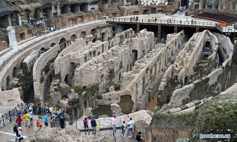 Tourists visit the hypogeum area of the Colosseo in Rome, Italy, on Aug. 24, 2021. The hypogeum area of the Colosseo, containing underground tunnels and rooms where gladiators and wild animals once prepared for battle, was accessible for visitors from June this year.(Photo: Xinhua)