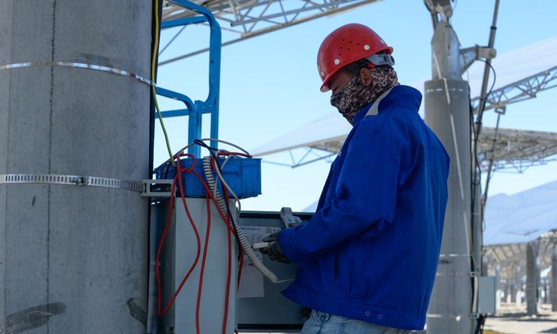 A technician maintains a heliostat at a photothermal power station in Hami, northwest China's Xinjiang Uygur Autonomous Region, Aug. 22, 2021. The photothermal power station is the first of its kind in Xinjiang. The project is a modern attempt by the region to capitalize on its abundant solar energy and turn it into heat and power. (Xinhua/Gao Han)



