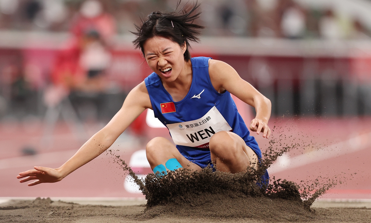 Wen Xiaoyan competes in the women's long jump - T37 on Sunday. Photo: VCG