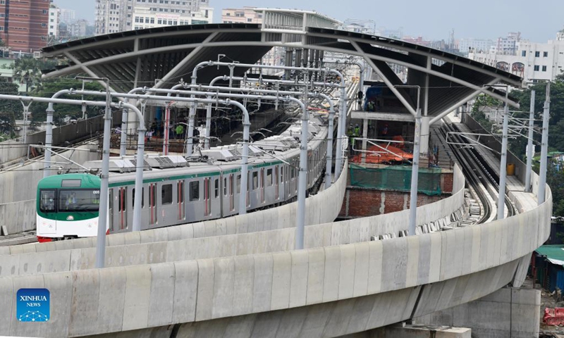 Aerial photo taken on Aug. 29, 2021 shows a scene from the first trial run of Bangladesh's metro rail service in Dhaka, Bangladesh. Bangladesh's first metro rail in the capital Dhaka made the trial run Sunday on a section of the 20.1-km project, known as Mass Rapid Transit Line-6 (MRT 6). Photo: Xinhua