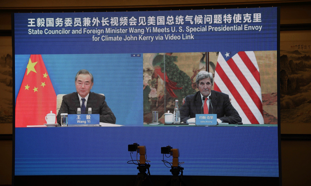 Chinese State Councilor and Foreign Minister Wang Yi meets with the US Special Presidential Envoy for Climate John Kerry via video link on Wednesday. Photo: AFP