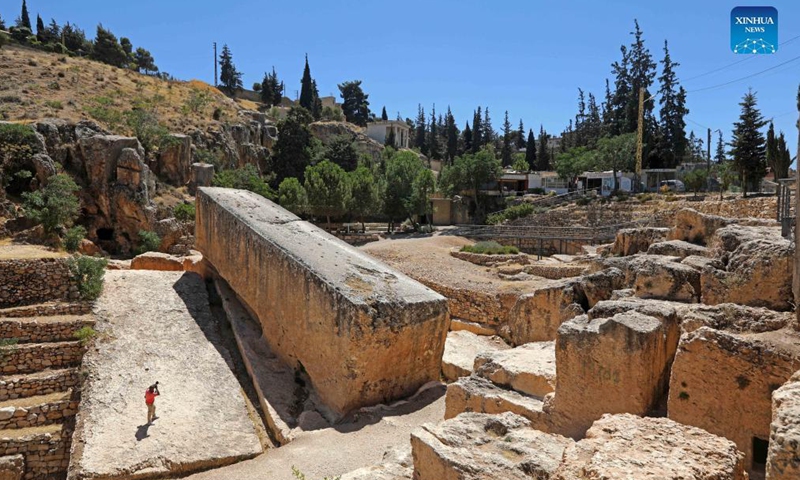 A man takes pictures of the Stone of the Pregnant Woman in the city of Baalbek, Lebanon, Sept. 2, 2021.Photo:Xinhua