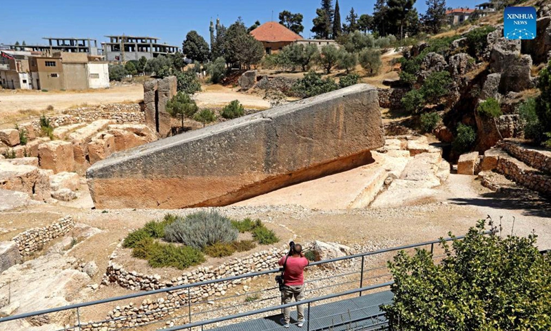 A man takes pictures of the Stone of the Pregnant Woman in the city of Baalbek, Lebanon, Sept. 2, 2021.Photo:Xinhua