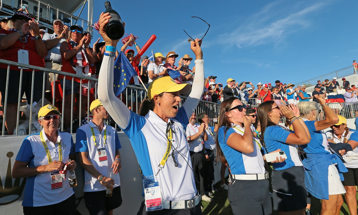 Giulia Molinaro celebrates after winning the 2021 Solheim Cup in Toledo, Ohio on Monday. Photo: VCG