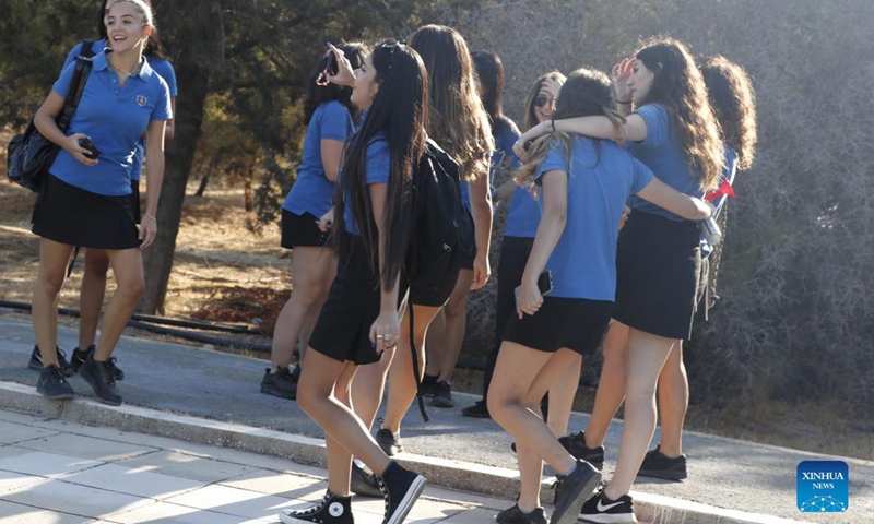 Students arrive at a school on the first day of a new school year in Nicosia, Cyprus, Sept. 7, 2021.(Photo: Xinhua)