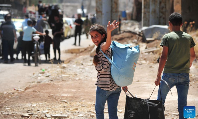 People return to their homes in Syria's southern province of Daraa, on Sept. 9, 2021. Thousands of people started returning to their homes in Daraa on Thursday following the army's entry to the formerly rebel-held areas, state news agency SANA reported.Photo:Xinhua