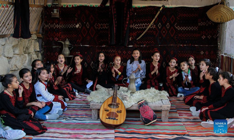 Children sing traditional songs as they participate in the first children's choir group to revive the Palestinian old heritage songs at Al Qarara Cultural Museum, east of the southern Gaza Strip city of Khan Younis, on Sept. 11, 2021.Photo: Xinhua