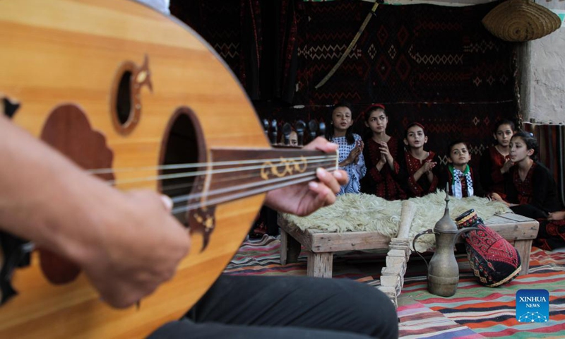 Children sing traditional songs as they participate in the first children's choir group to revive the Palestinian old heritage songs at Al Qarara Cultural Museum, east of the southern Gaza Strip city of Khan Younis, on Sept. 11, 2021.Photo: Xinhua