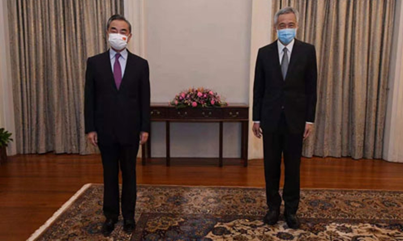 Chinese State Councilor and Foreign Minister, Wang Yi meets with Singapore Prime Minister Lee Hsien Loong on September 14, 2021 in Singapore. Photo: Ministry of Foreign Affairs of China