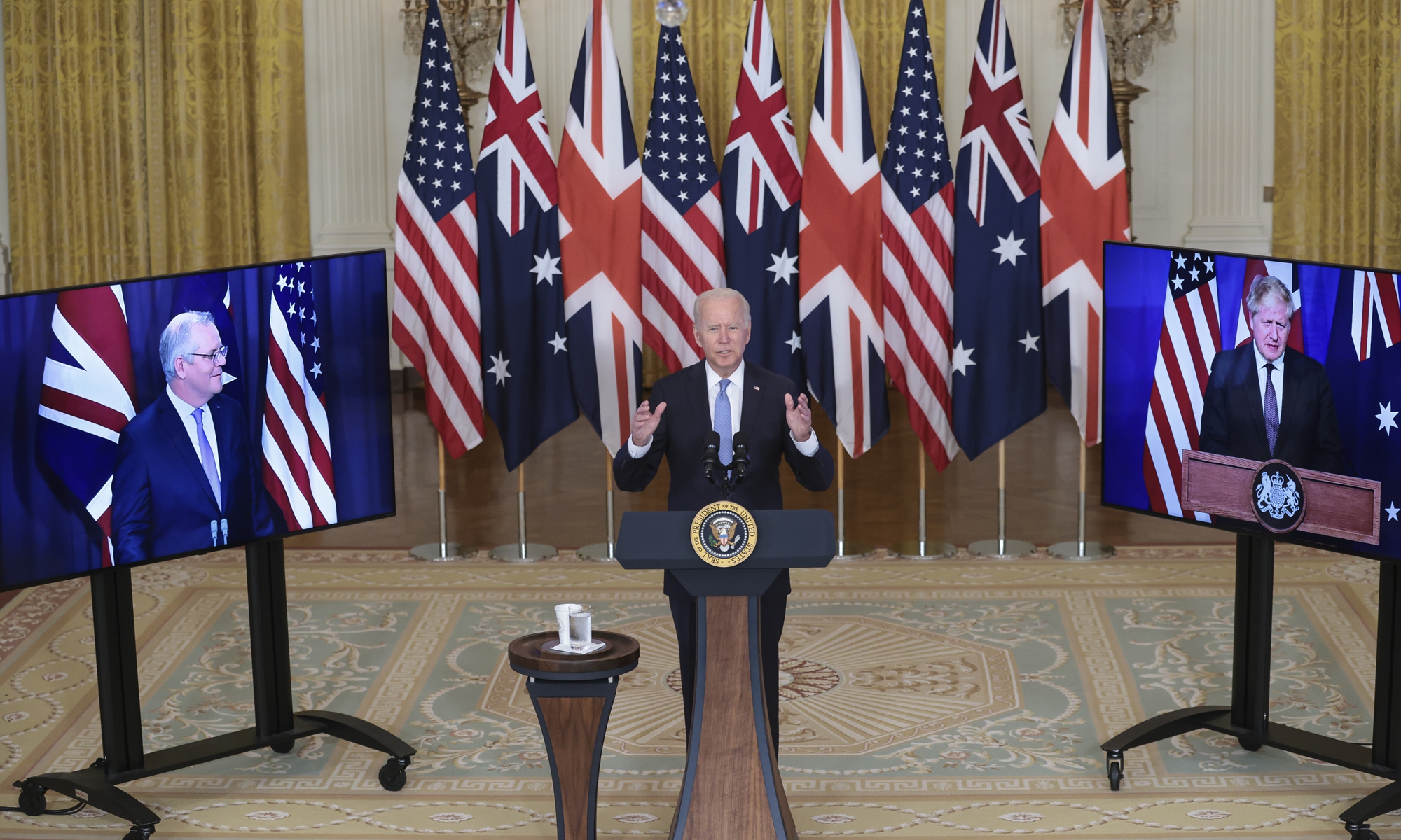 US President Joe Biden delivers remarks about a national security initiative in the East Room of the White House in Washington, DC, on Wednesday. Australian Prime Minister Scott Morrison (left) and British Prime Minister Boris Johnson (right) participated virtually. Photo: IC