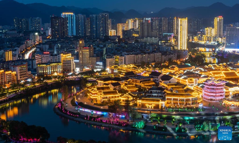 Photo taken on Sept. 1, 2021 shows the night view of Zhongnanmen Historical and Cultural Tourist Area in Tongren City, southwest China's Guizhou Province. (Photo by Peng Jun/Xinhua)