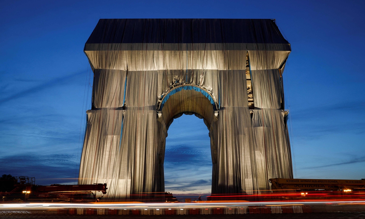 Wrapping of Arc de Triomphe begins in Paris art installation