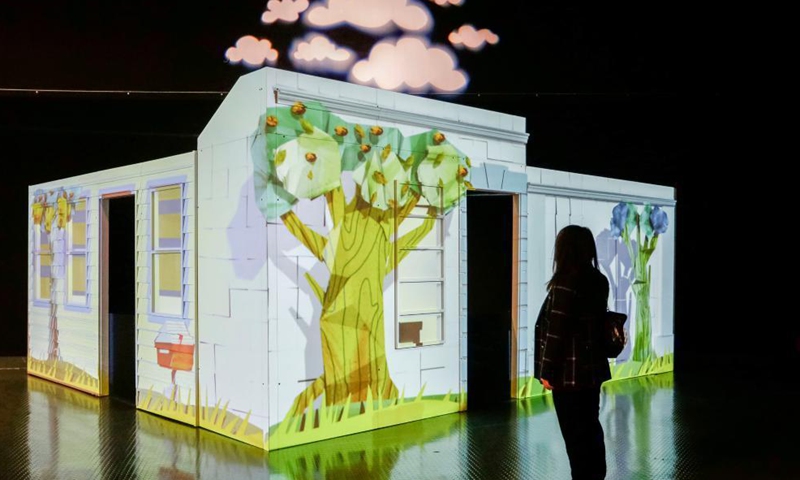 A visitor looks at an interactive exhibit during a media preview of the Backyard Adventures exhibition at Science World in Vancouver, British Columbia, Canada, on Sept. 28, 2021.Photo:Xinhua