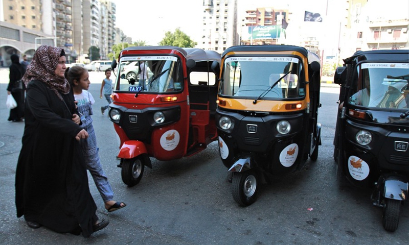 Tuk-tuks wait for passengers on a street in Tripoli, Lebanon, on Oct. 8, 2021.(Photo: Xinhua)