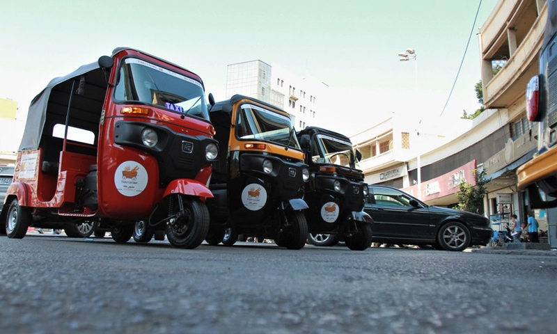 Tuk-tuks wait for passengers on a street in Tripoli, Lebanon, on Oct. 8, 2021.(Photo: Xinhua)