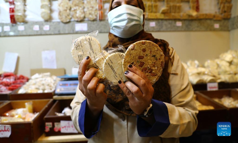 A vendor shows special candies and sweets for the Prophet Muhammad's birthday celebration at a store in Tanta City, Governorate of Gharbia, Egypt, on Oct. 11, 2021. The special candies and sweets have been a major feature of Egyptian celebrations on the birthday of the Prophet Muhammad, which falls on Oct. 19 this year. (Xinhua/Ahmed Gomaa)