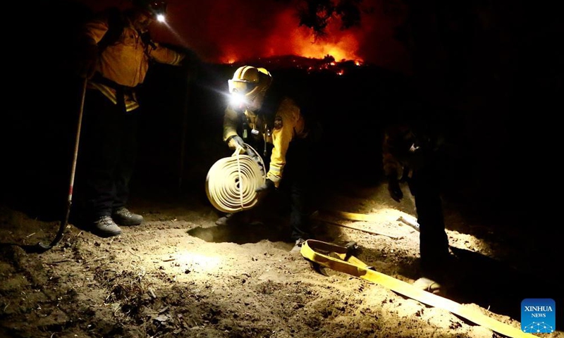 Firefighters work to contain the Alisal Fire in Santa Barbara County, California, the United States, Oct. 13, 2021.Photo:Xinhua