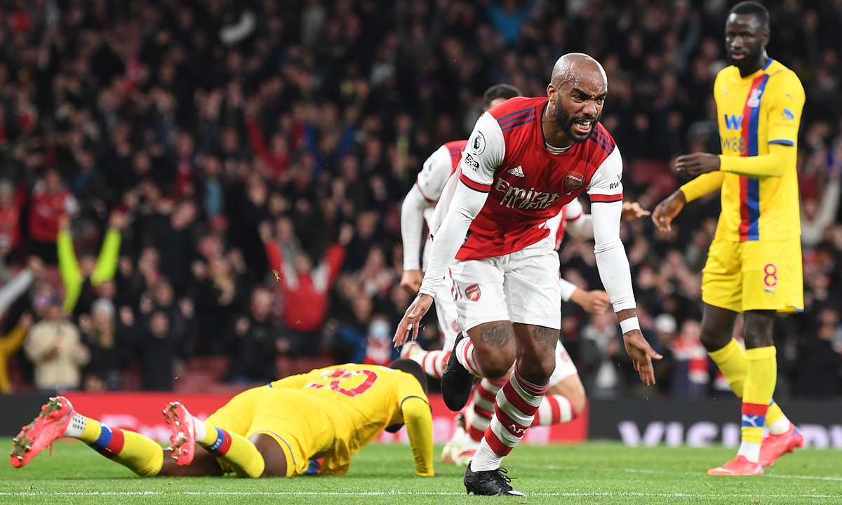 Alexandre  Lacazette of Arsenal celebrates scoring against Crystal Palace on Monday in London, England. Photo: VCG