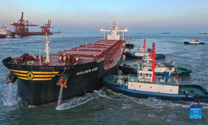 Aerial photo taken on Oct. 20, 2021 shows a bulk carrier berthing at ore wharf of Caofeidian Port in Tangshan, north China's Hebei Province. Photo: Xinhua